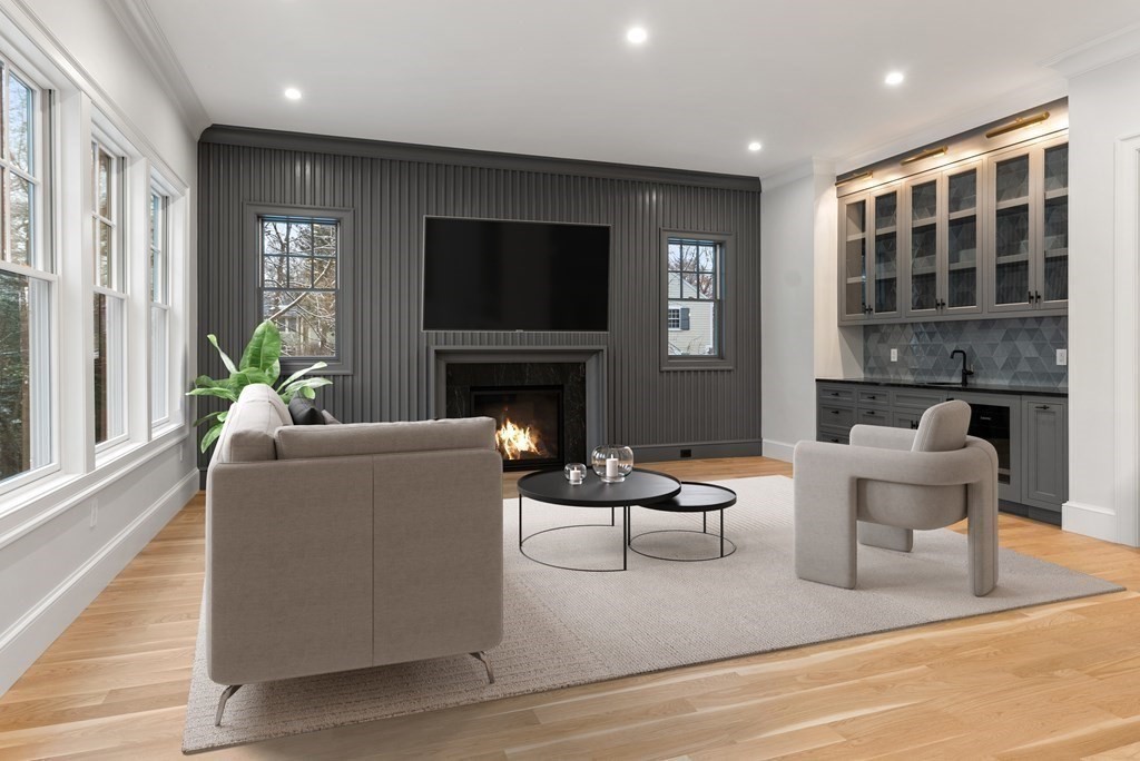 76 Bristol Road Wellesley, MA 02481 - Photo 4 of 36 a living room with furniture and a fireplace