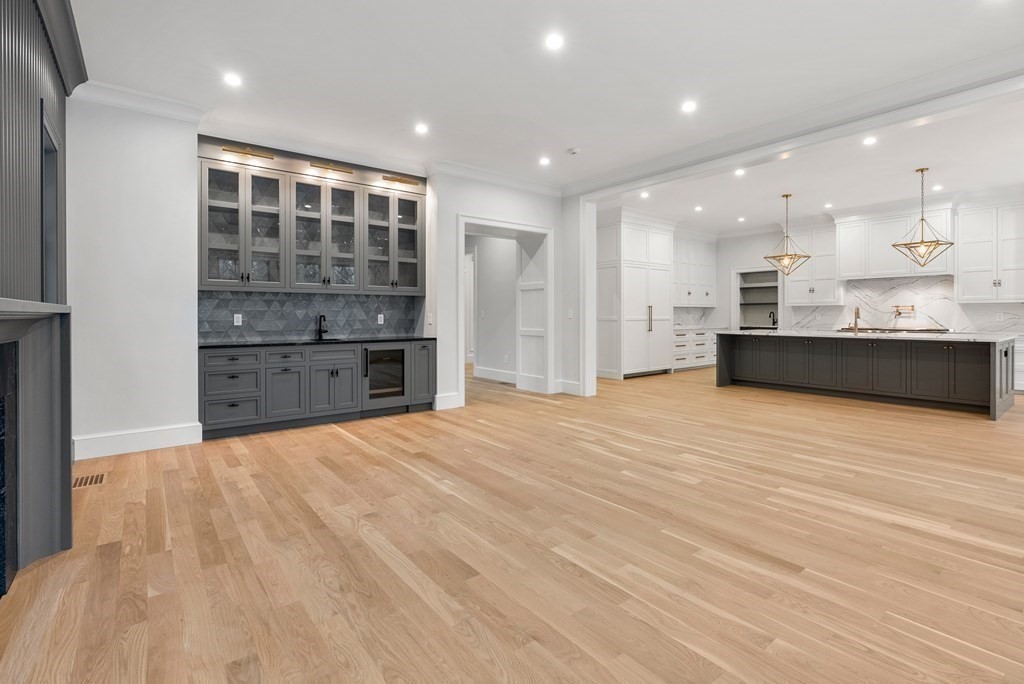76 Bristol Road Wellesley, MA 02481 - Photo 7 of 36 a view of kitchen and kitchen with granite countertop wooden floor