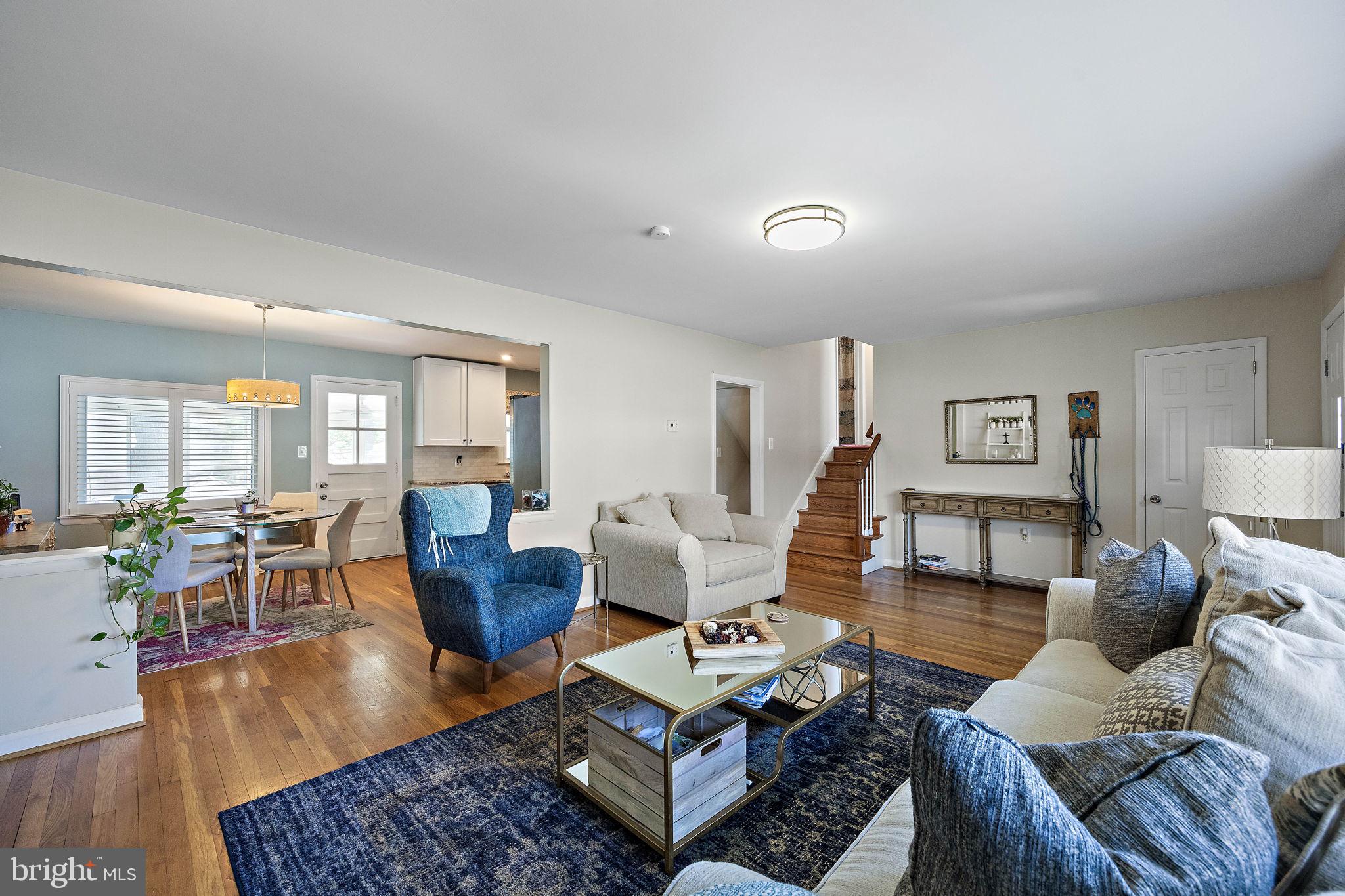 1010 Graylyn Road Wilmington, DE 19803 - Photo 7 of 32 a living room with furniture and wooden floor