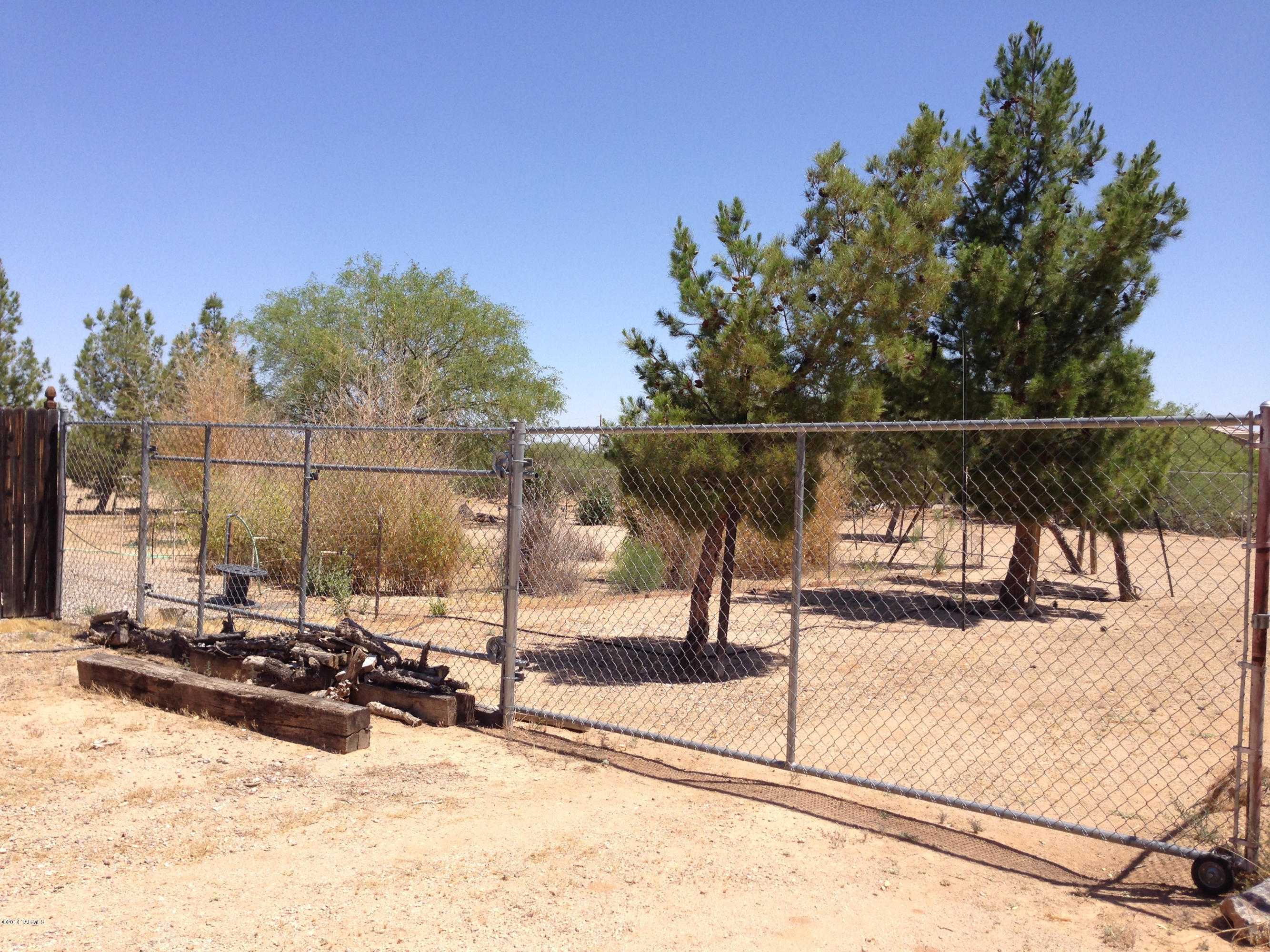 4515 South Aldon Road Tucson, AZ 85735 - Photo 22 of 32 a view of a terrace with trees