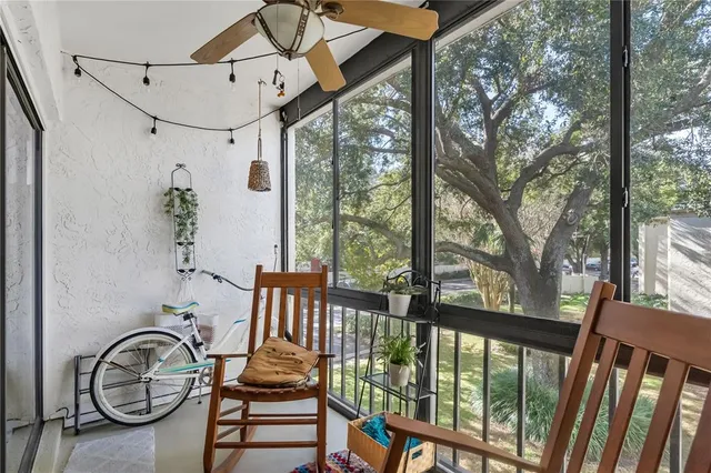 a view of porch with furniture and a porch
