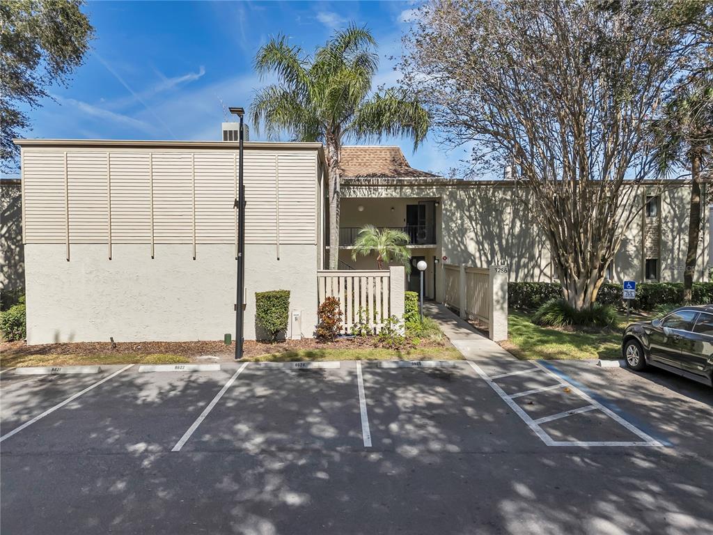3286 South Semoran Boulevard, Unit 25 Orlando, FL 32822 - Photo 16 of 30 a view of a house with a yard