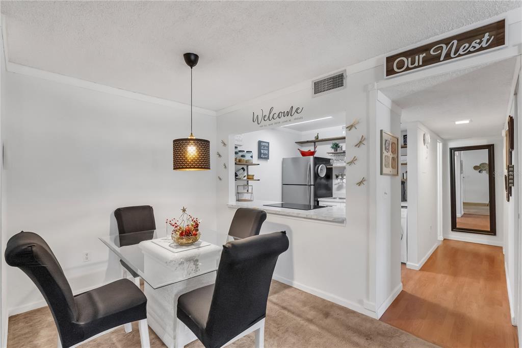 3286 South Semoran Boulevard, Unit 25 Orlando, FL 32822 - Photo 2 of 30 a workspace with furniture and window