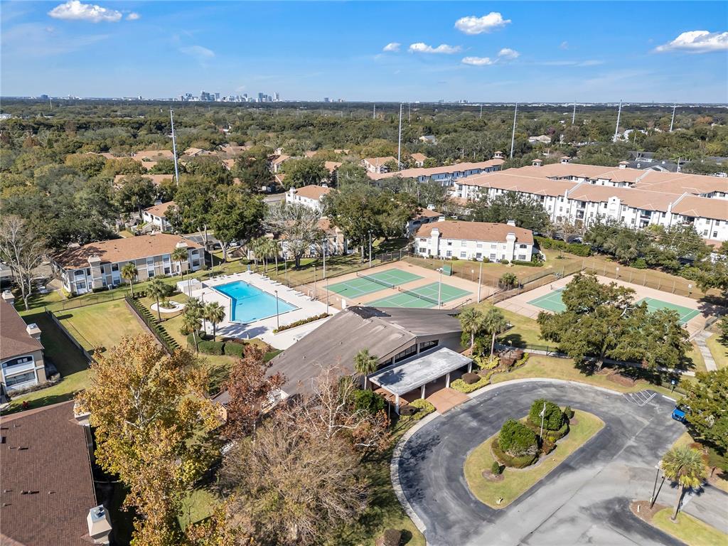 3286 South Semoran Boulevard, Unit 25 Orlando, FL 32822 - Photo 21 of 30 an aerial view of residential houses with outdoor space