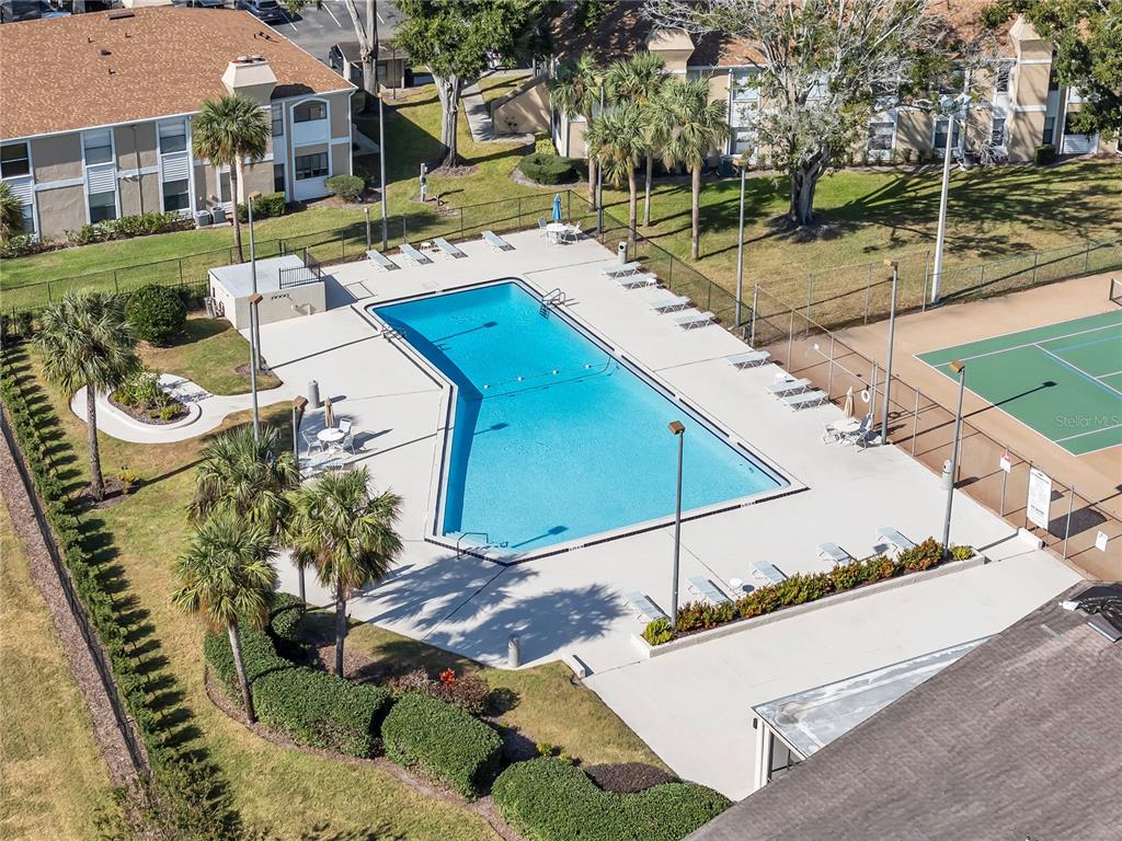 3286 South Semoran Boulevard, Unit 25 Orlando, FL 32822 - Photo 25 of 30 a view of a street with houses