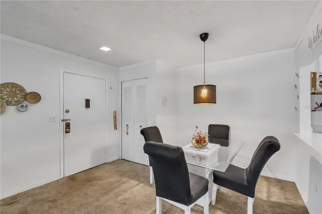 a work room with furniture and a window