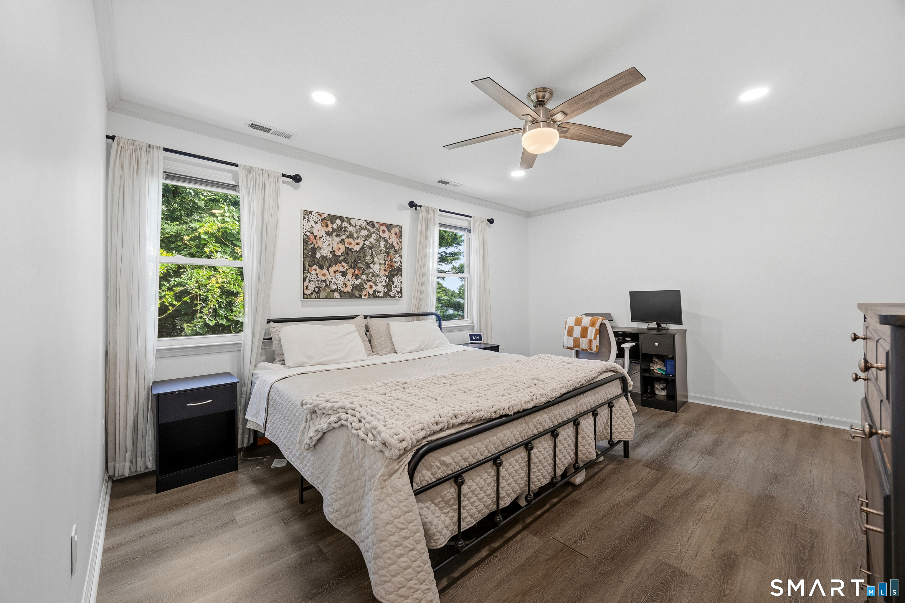 55 Mill Plain Road, Unit 121 Danbury, CT 06811 - Photo 17 of 33 New vinyl plank flooring, crown molding, recessed lighting and a ceiling fan were all recent upgrades to add to the beauty and comfort of this space.