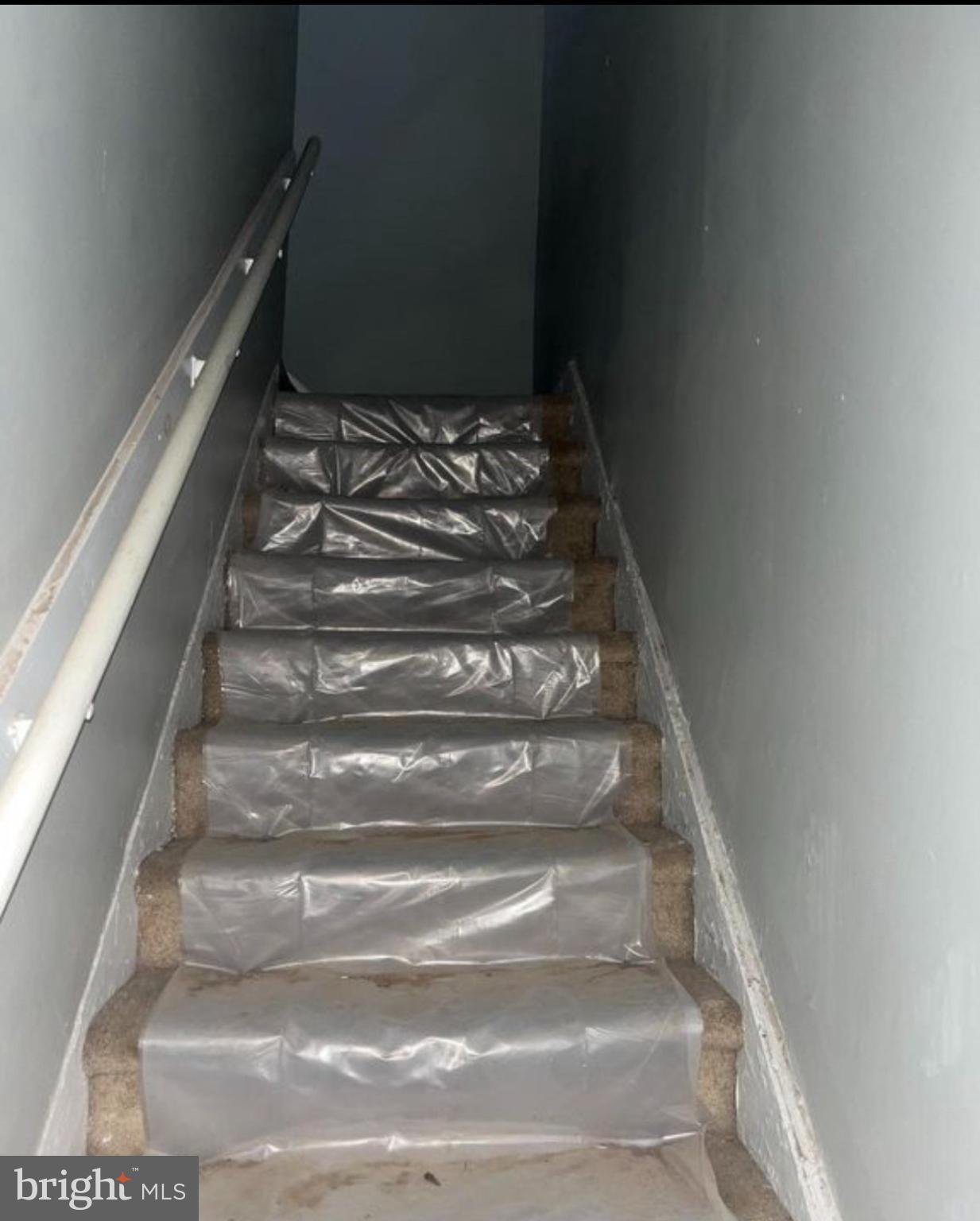 210 West Union Street Burlington, NJ 08016 - Photo 4 of 7 Stairway wrapped in protective sheeting.