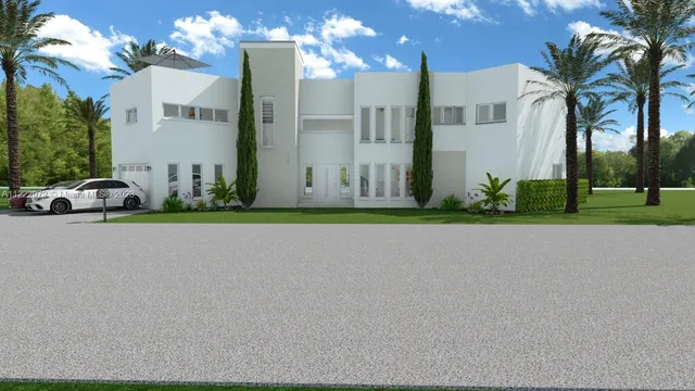 a front view of a building with garden