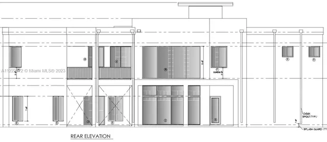 a black and white photo of a living room