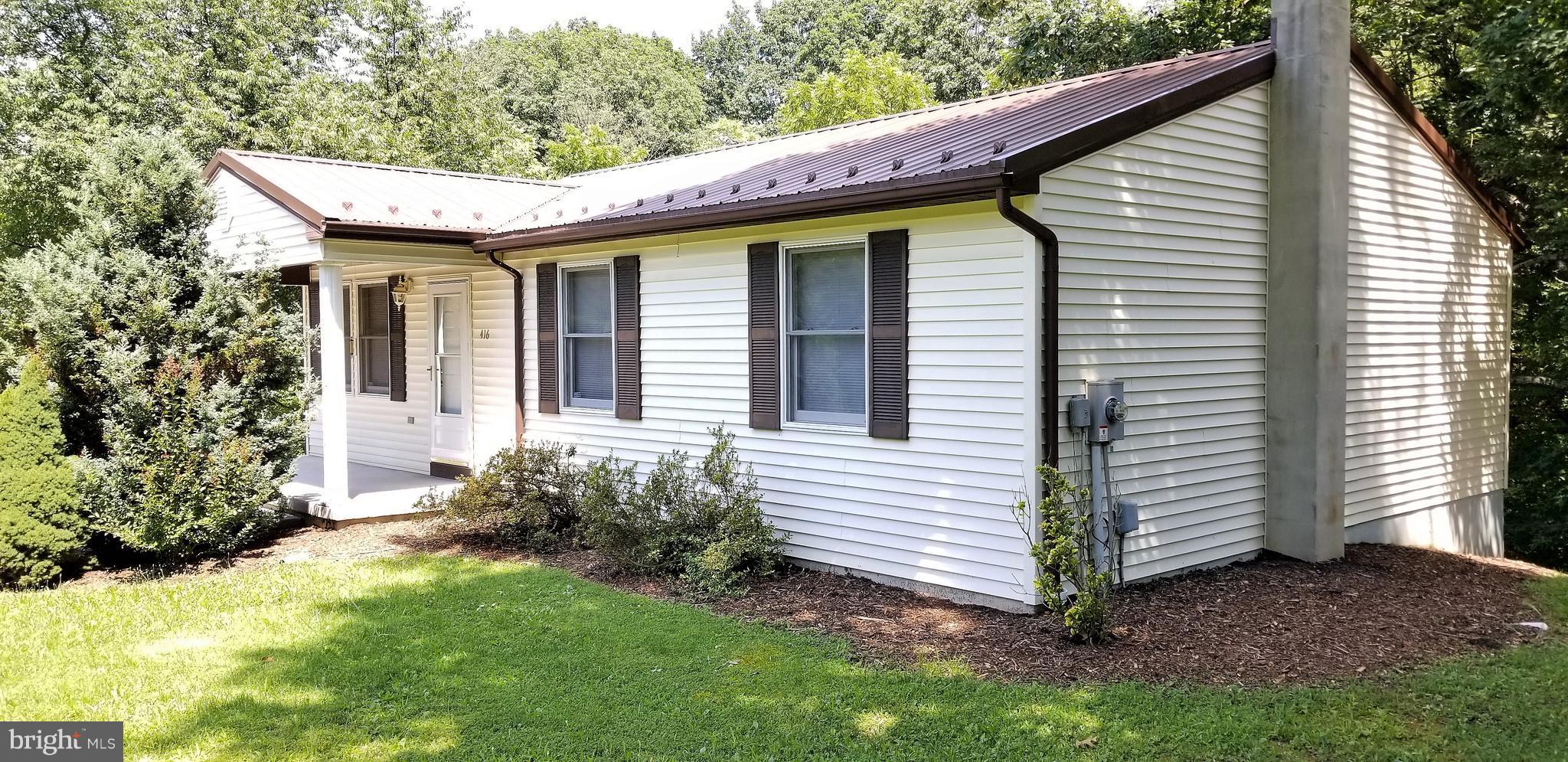 416 Paradise Valley Road Falling Waters, WV 25419 - Photo 2 of 30 Metal roof only 2 years old!