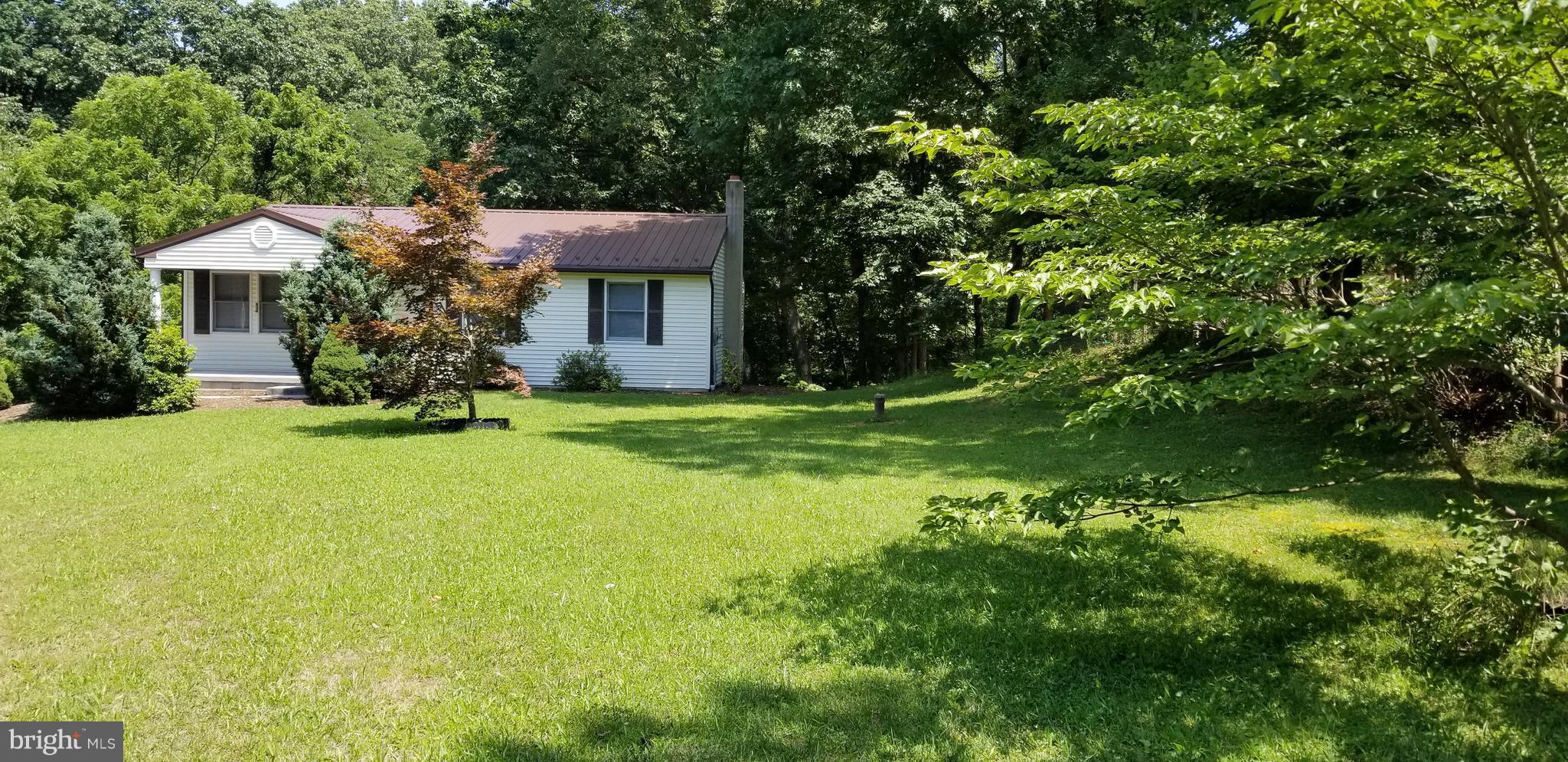 416 Paradise Valley Road Falling Waters, WV 25419 - Photo 4 of 30 Shaded front yard