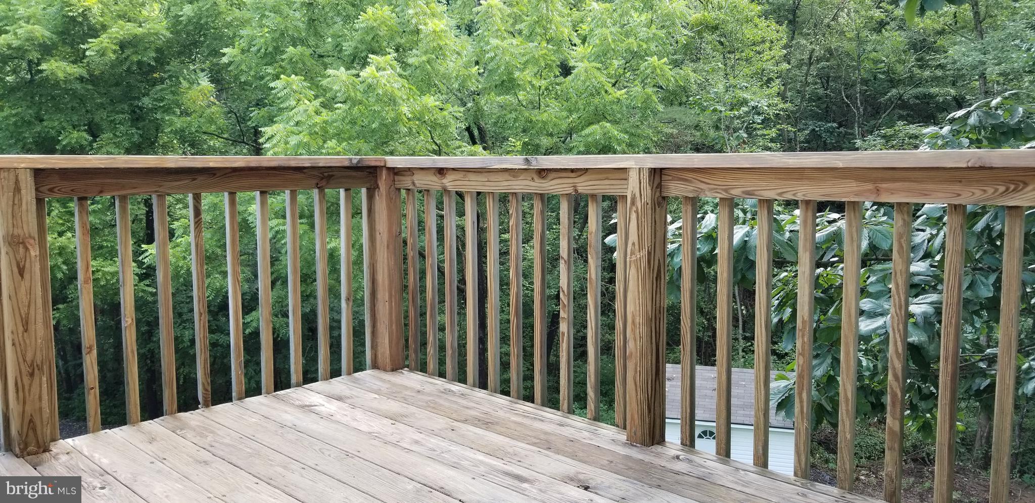 416 Paradise Valley Road Falling Waters, WV 25419 - Photo 7 of 30 Listen to the stream from your back deck!