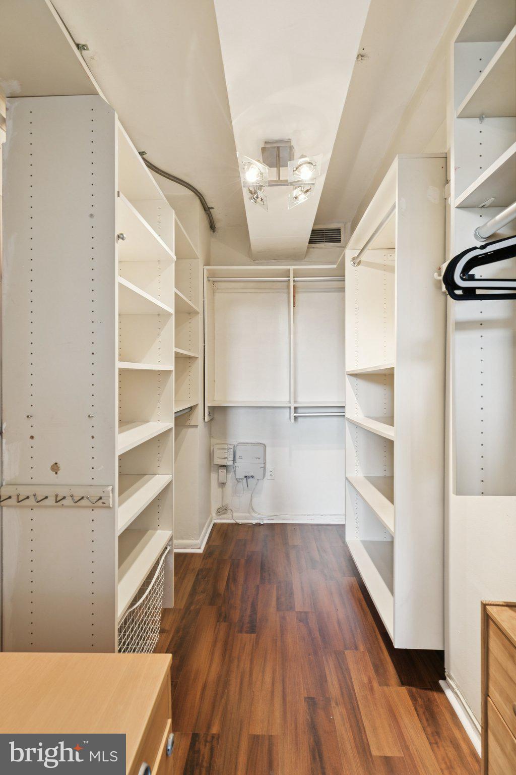191 Presidential Boulevard, Unit R724 Bala Cynwyd, PA 19004 - Photo 13 of 19 a view of a room with shelves on the wall