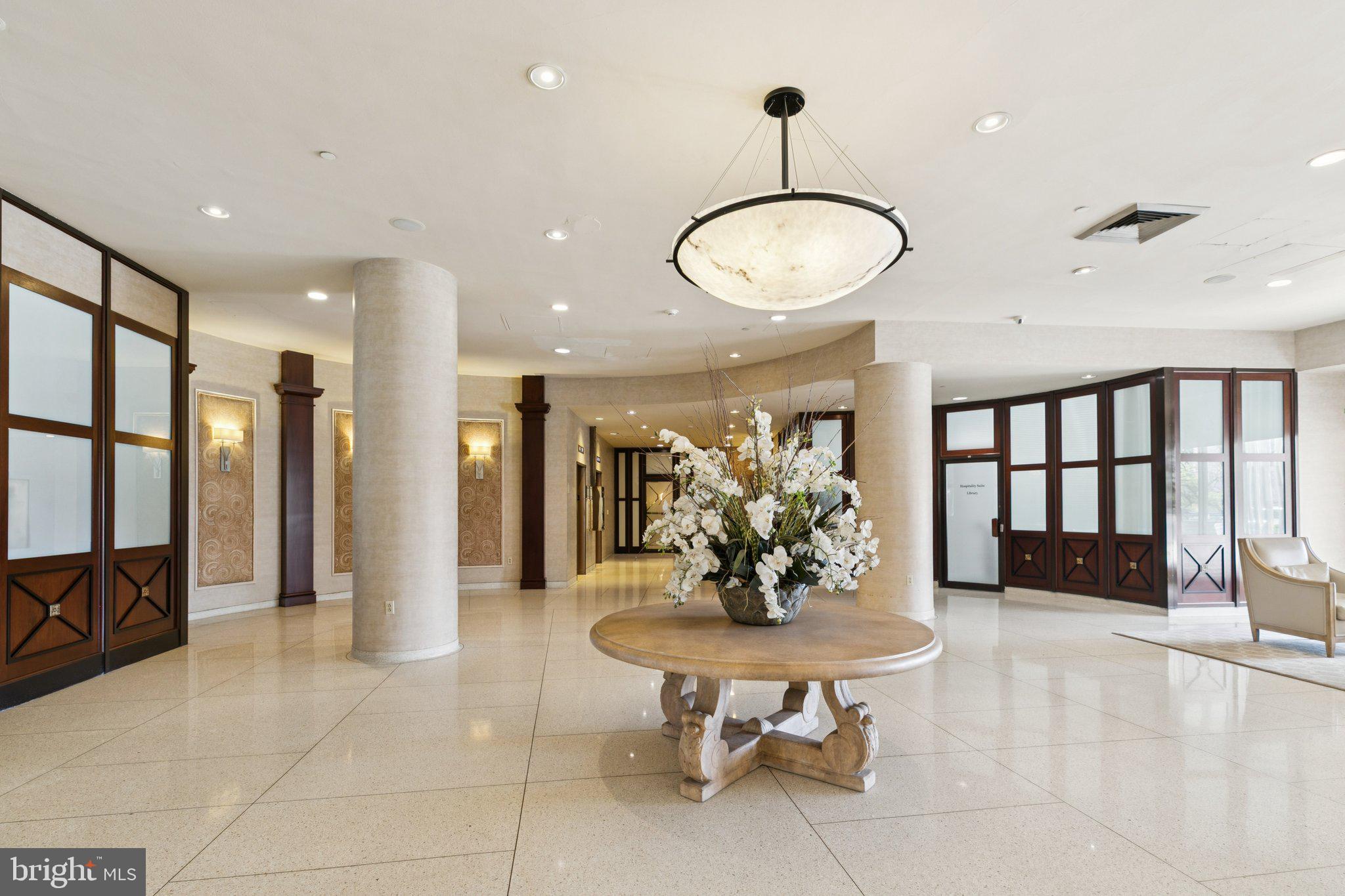 191 Presidential Boulevard, Unit R724 Bala Cynwyd, PA 19004 - Photo 19 of 19 a view of a livingroom with furniture and a chandelier