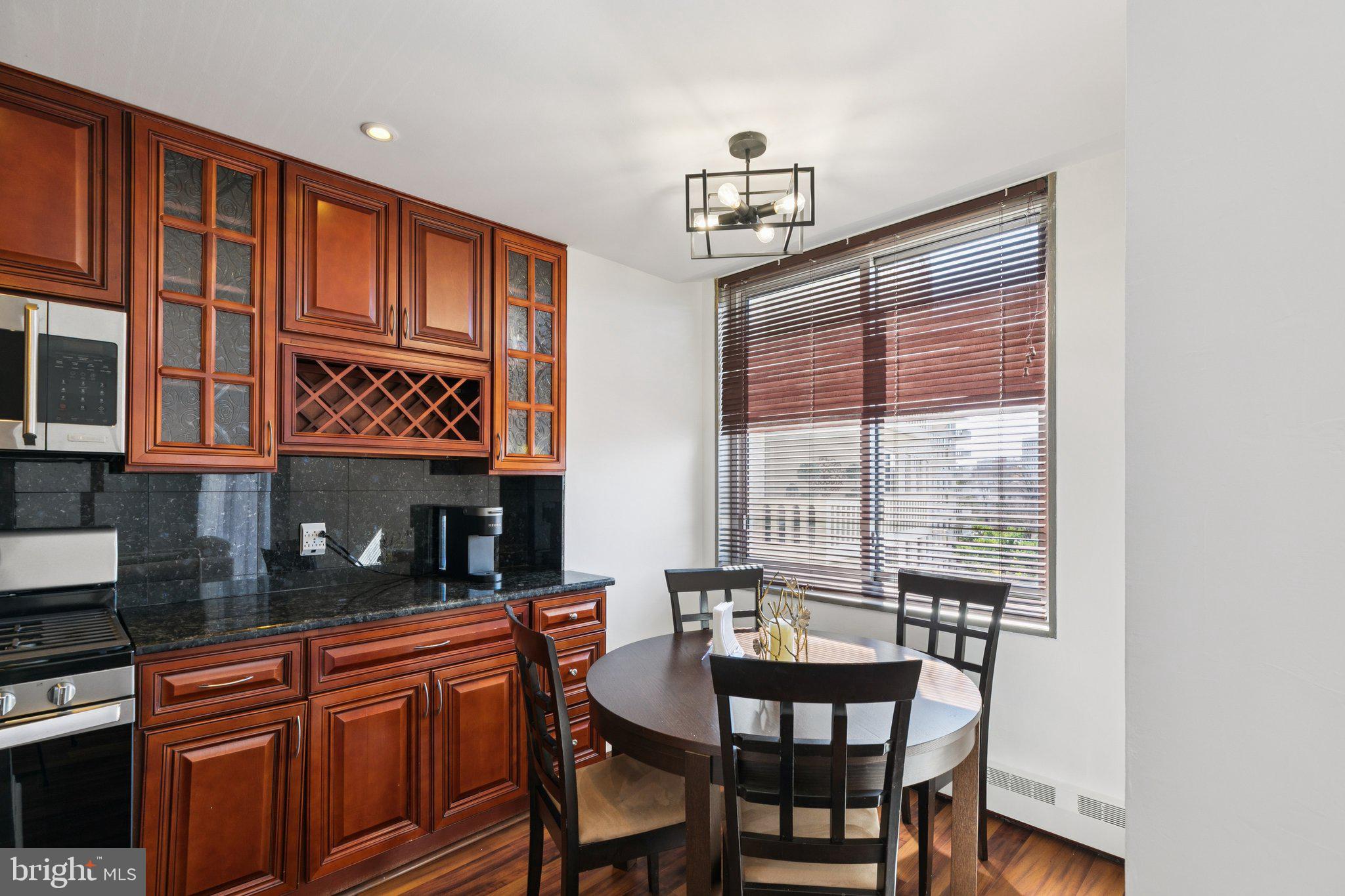 191 Presidential Boulevard, Unit R724 Bala Cynwyd, PA 19004 - Photo 8 of 19 a kitchen with stainless steel appliances granite countertop a sink and cabinets