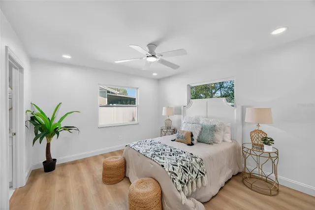 a bathroom with a shower and a sink