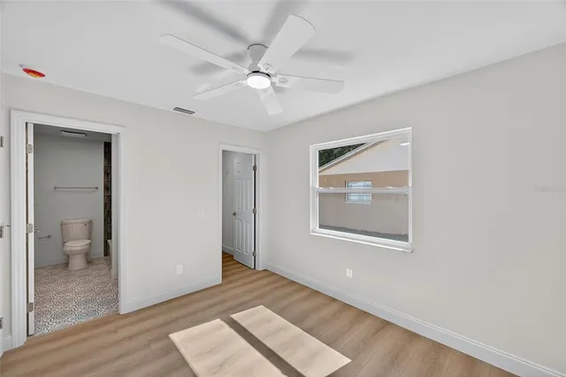 a backyard of a house with lots of green space