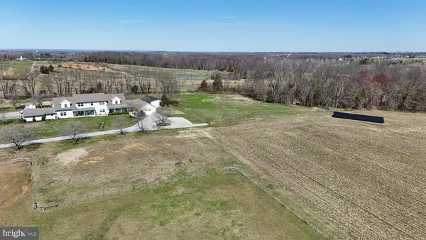 a view of a lake with a yard