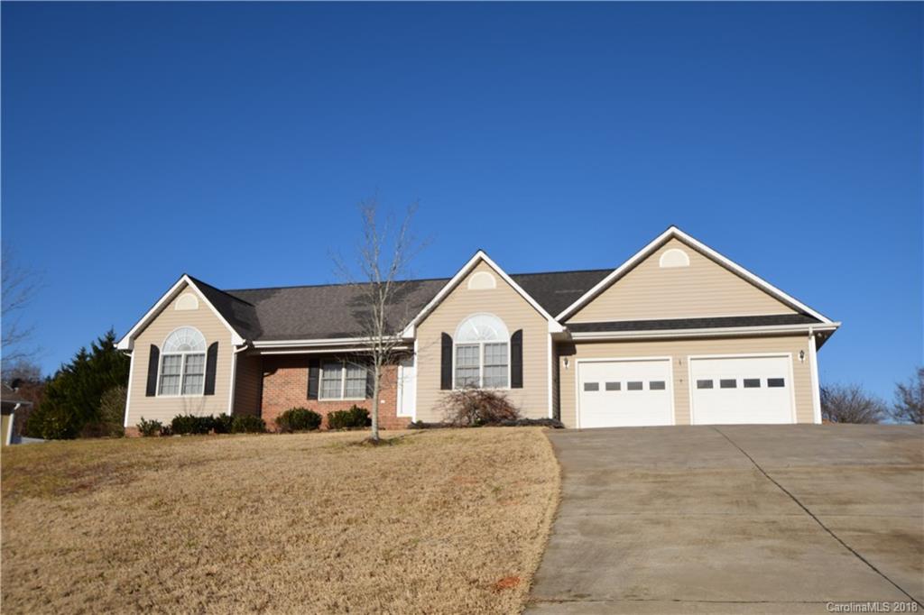 171 Hunters Trace Rutherfordton, NC 28139 - Photo 1 of 24 a view of a house with a yard and large tree