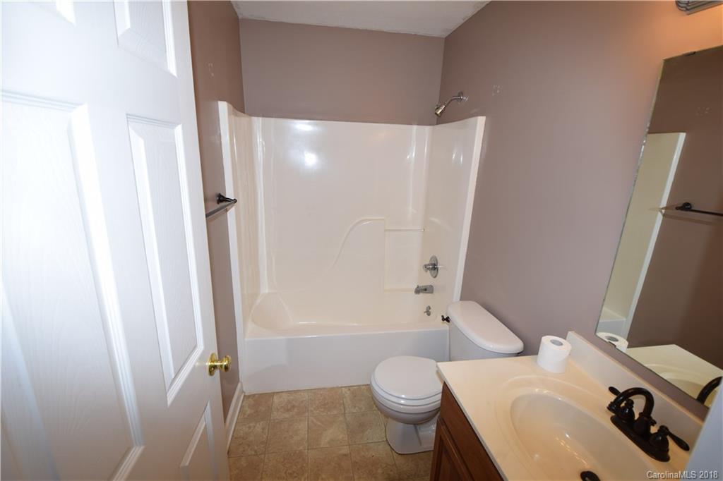 171 Hunters Trace Rutherfordton, NC 28139 - Photo 15 of 24 a bathroom with a sink toilet and shower