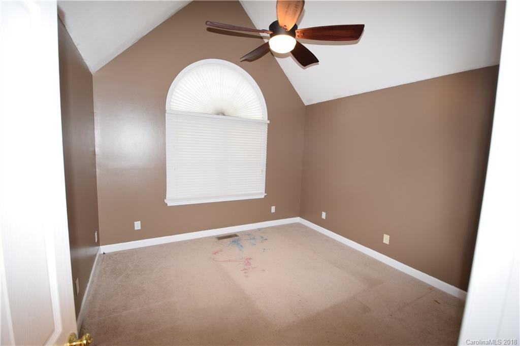 171 Hunters Trace Rutherfordton, NC 28139 - Photo 16 of 24 an empty room with windows and fan