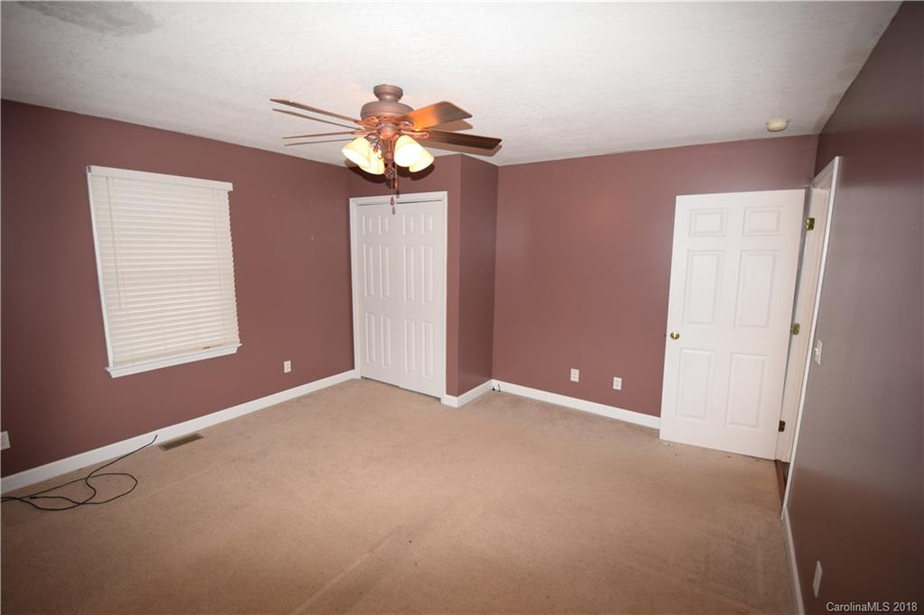 171 Hunters Trace Rutherfordton, NC 28139 - Photo 18 of 24 a view of an empty room with a window