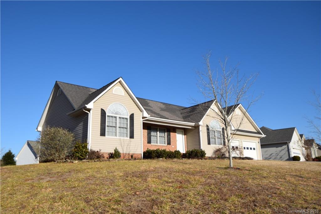 171 Hunters Trace Rutherfordton, NC 28139 - Photo 21 of 24 a view of a house with a yard