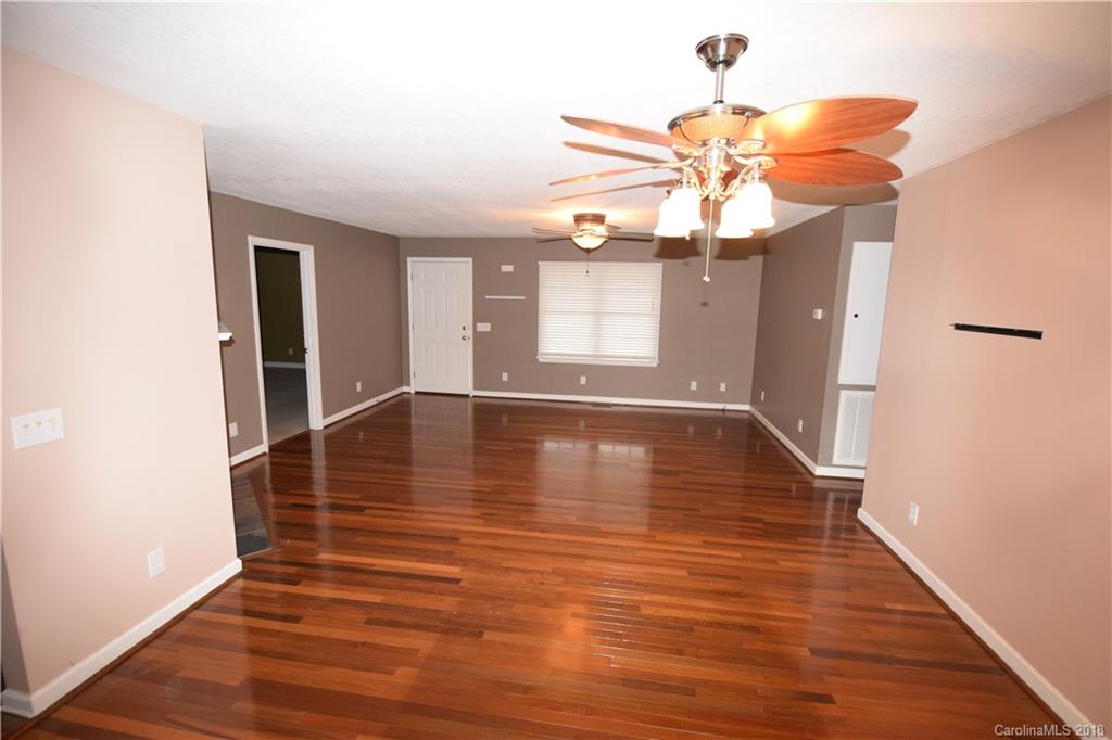 171 Hunters Trace Rutherfordton, NC 28139 - Photo 8 of 24 a view of a livingroom with wooden floor