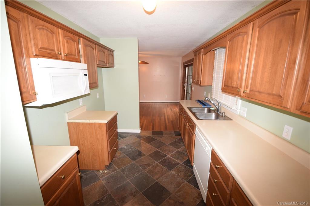 171 Hunters Trace Rutherfordton, NC 28139 - Photo 9 of 24 a room with sink and window