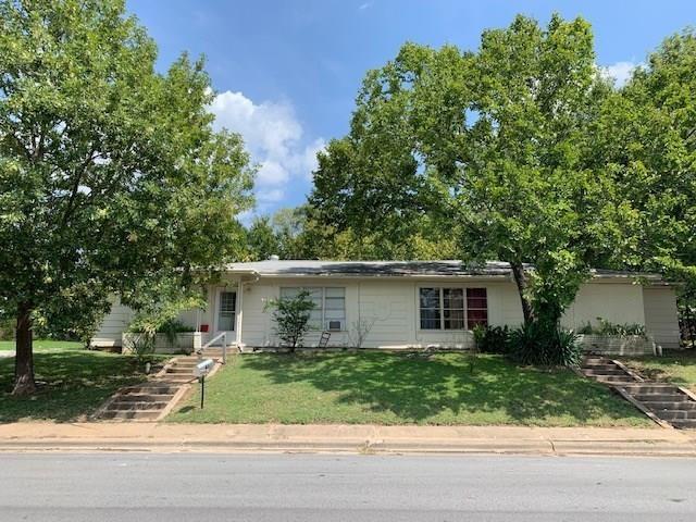 10 Pershing Drive, Unit A Denison, TX 75020 - Photo 3 of 15 a house view with a garden space