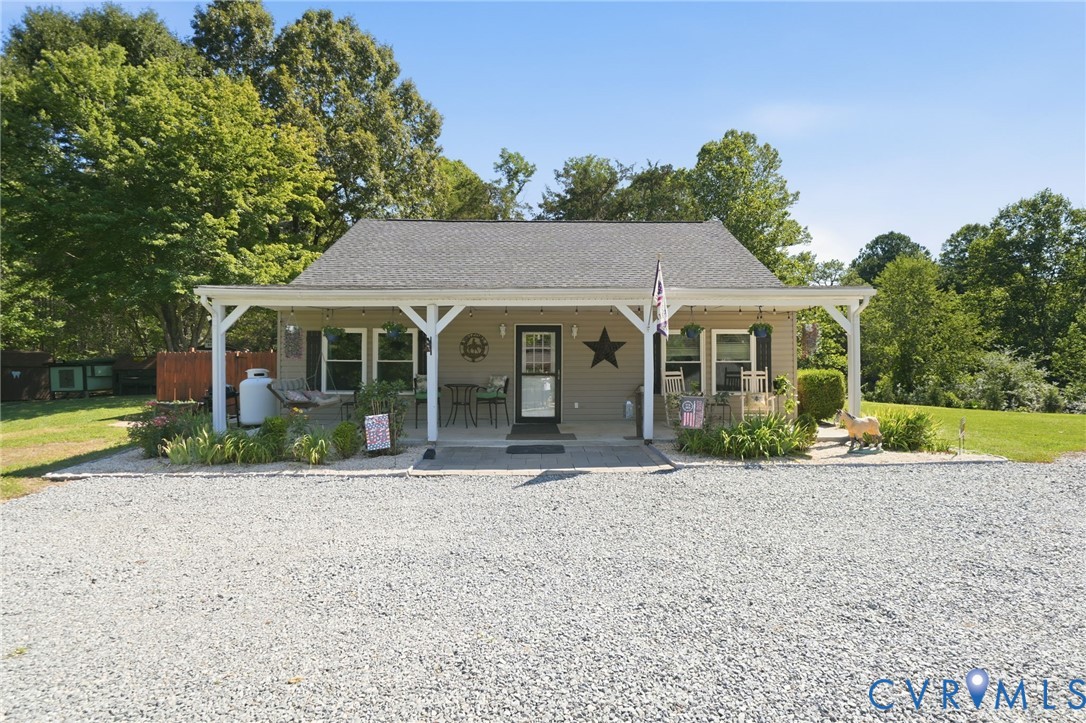 89 Old House Farm Road Bumpass, VA 23024 - Photo 1 of 67 Charming single-story structure with a covered fro