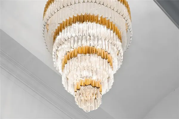 a living room with furniture flat screen tv and wooden floor