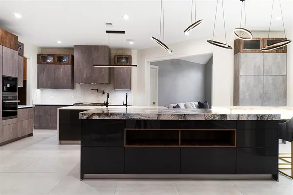 a kitchen with a sink and cabinets