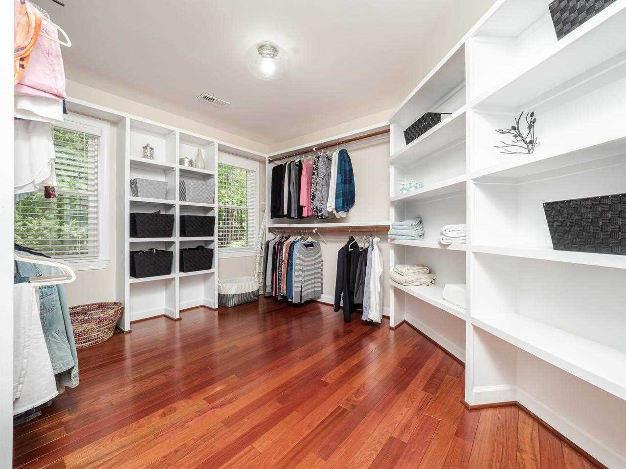 12329 Chastain Drive Raleigh, NC 27614 - Photo 7 of 30 Even tall men's shirts don't touch the ground while on a hanger! Every detail has been thought of! Huge custom Master Closet