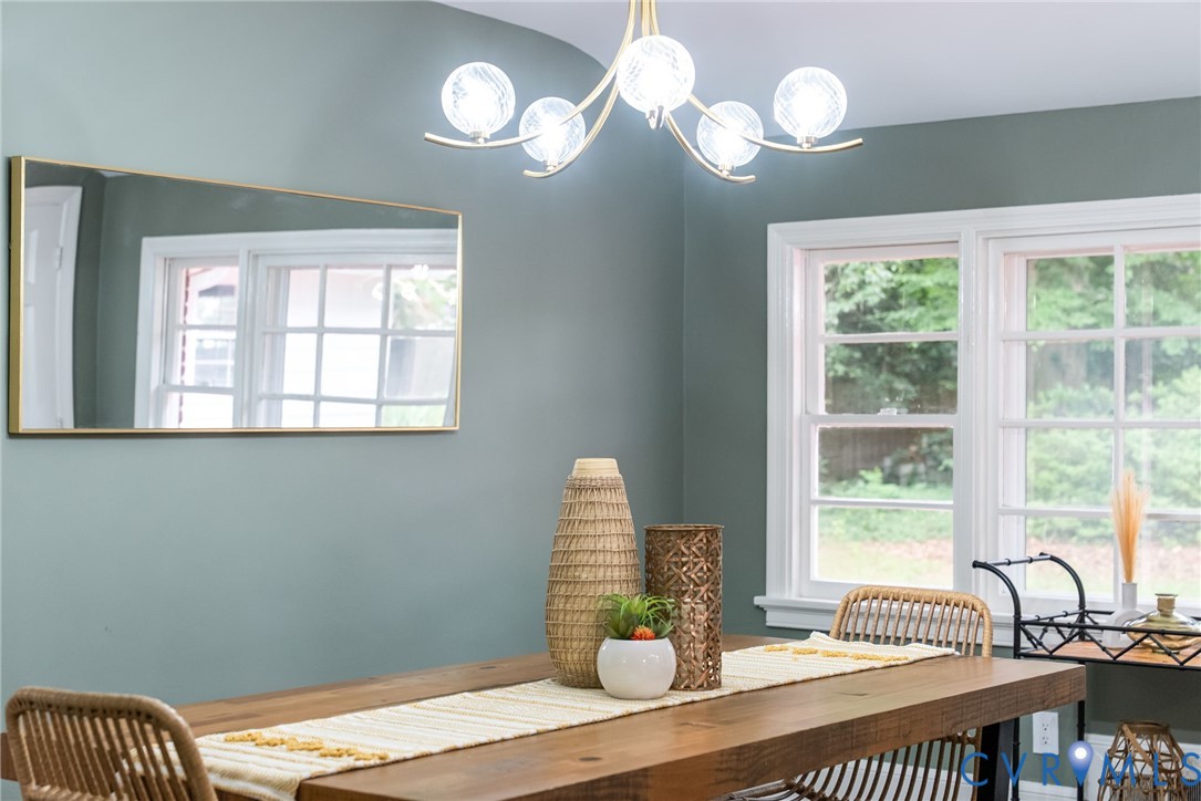 1136 Overbrook Road Petersburg, VA 23805 - Photo 16 of 51 Dining area featuring a modern chandelier, a recta