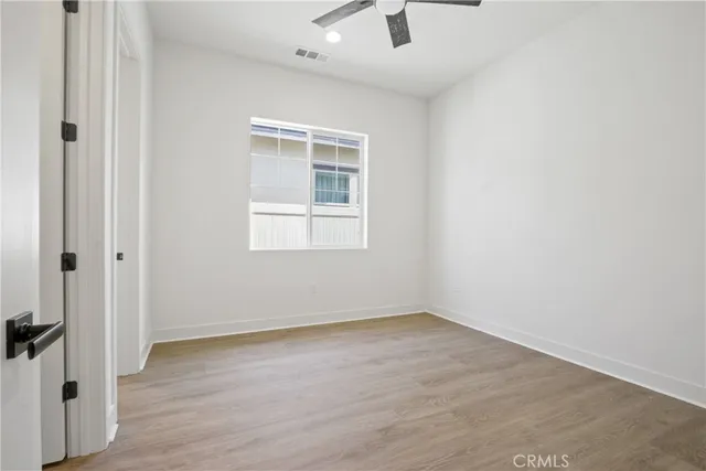 a bathroom with a double vanity sink and mirror