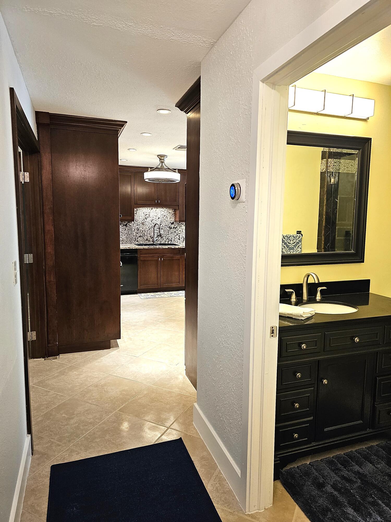 12575 52nd Road North The Acreage, FL 33411 - Photo 19 of 65 Bedroom Hallway leading to kitchen
