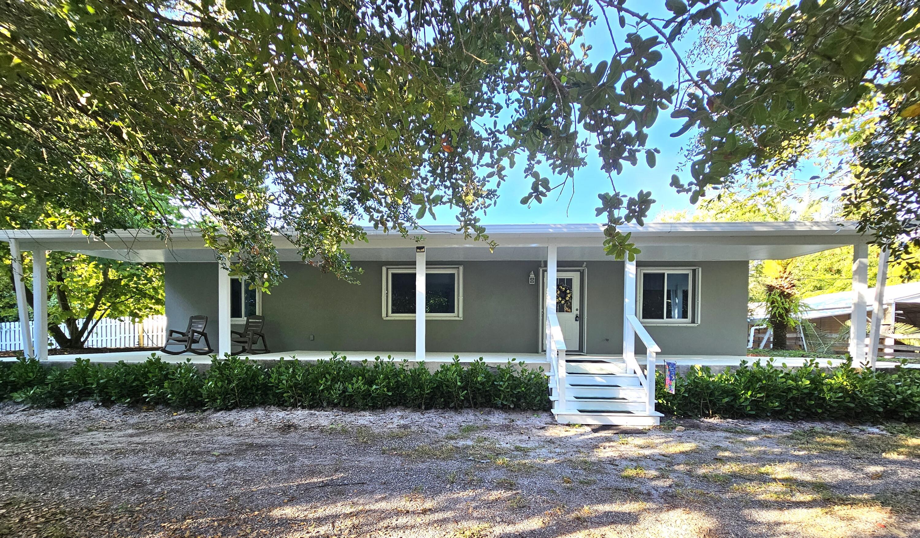 12575 52nd Road North The Acreage, FL 33411 - Photo 2 of 65 Front of home