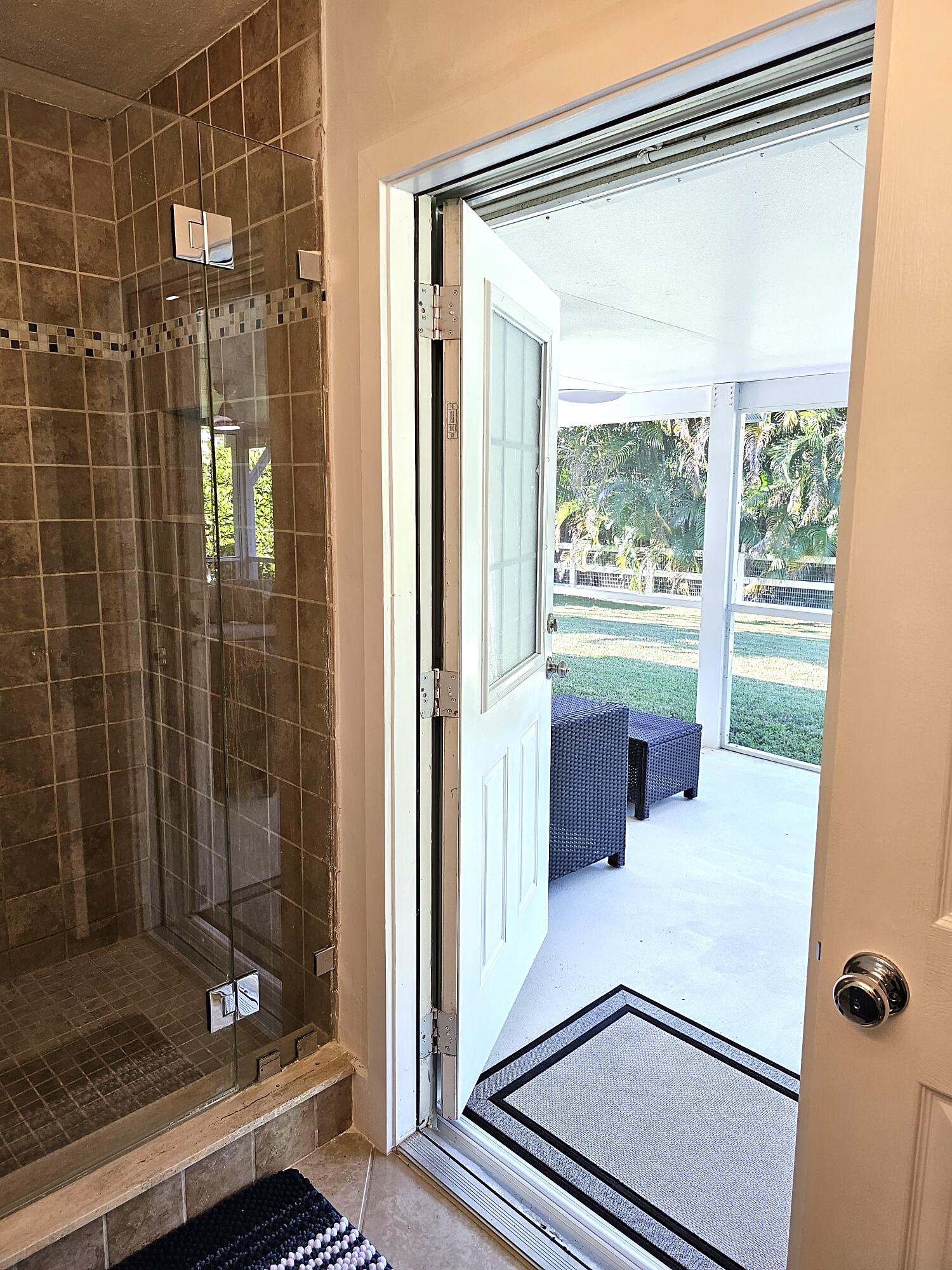 12575 52nd Road North The Acreage, FL 33411 - Photo 25 of 65 Primary bathroom exterior door