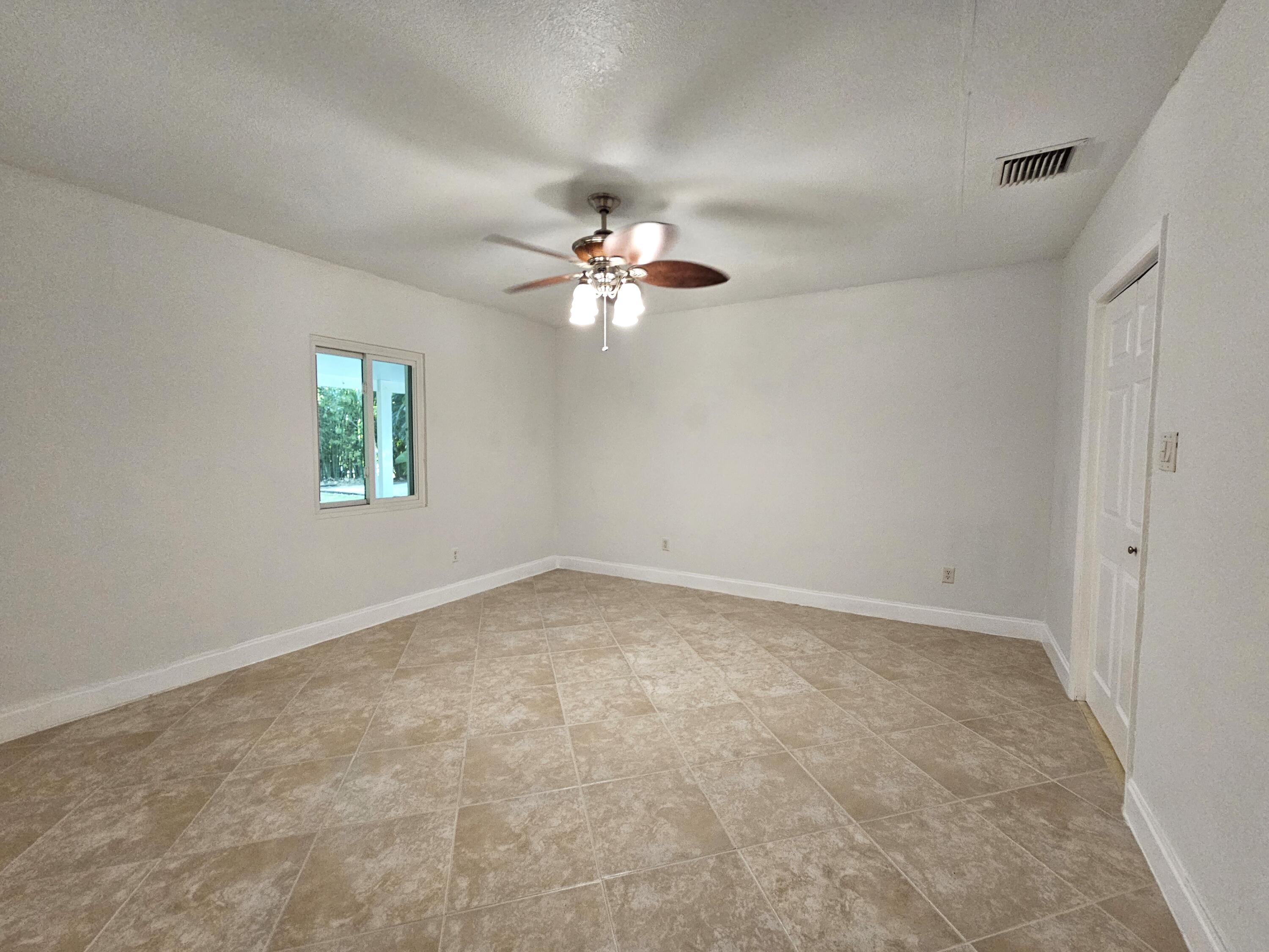 12575 52nd Road North The Acreage, FL 33411 - Photo 28 of 65 1st guest bedroom