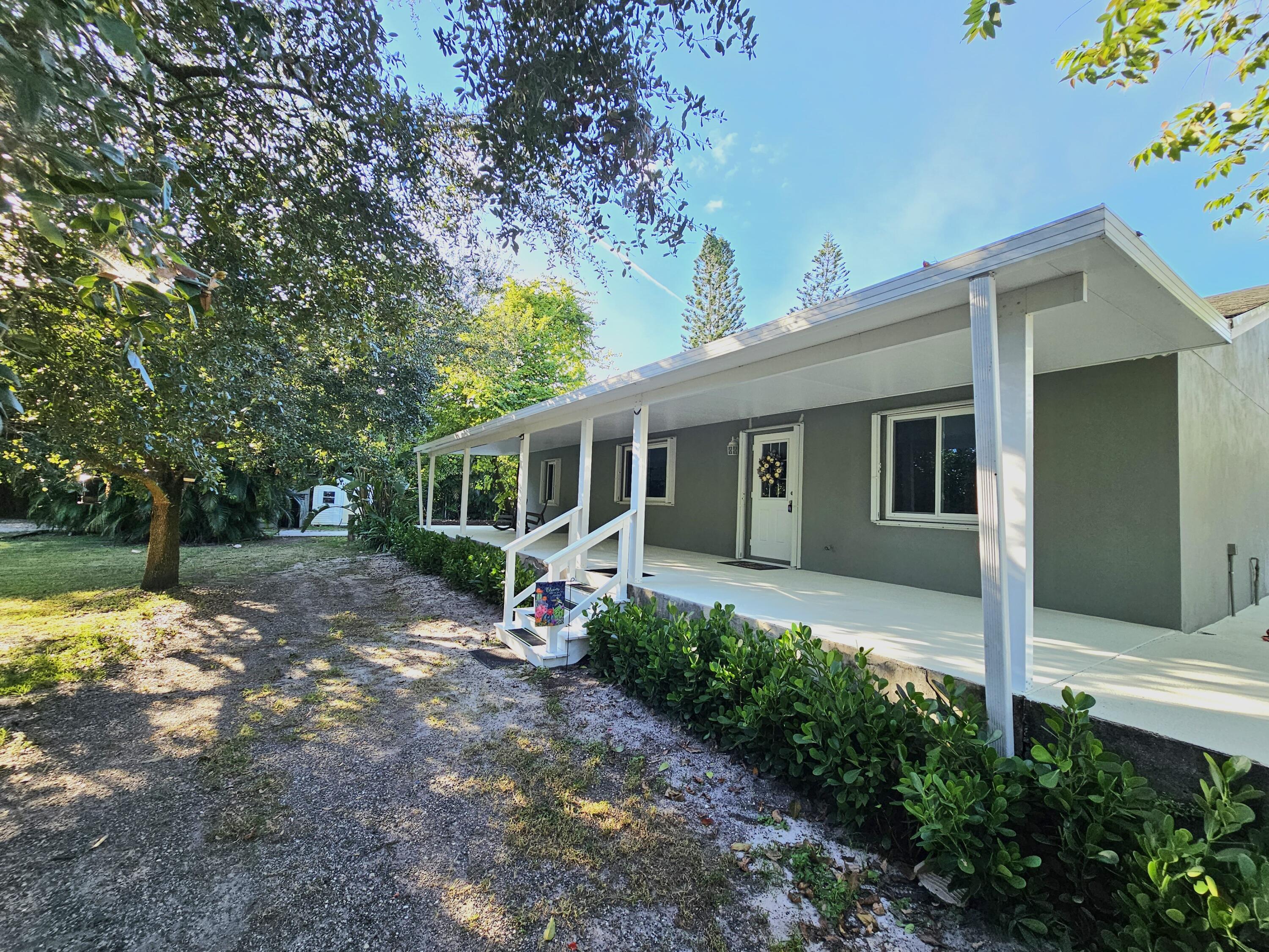 12575 52nd Road North The Acreage, FL 33411 - Photo 3 of 65 Front of home