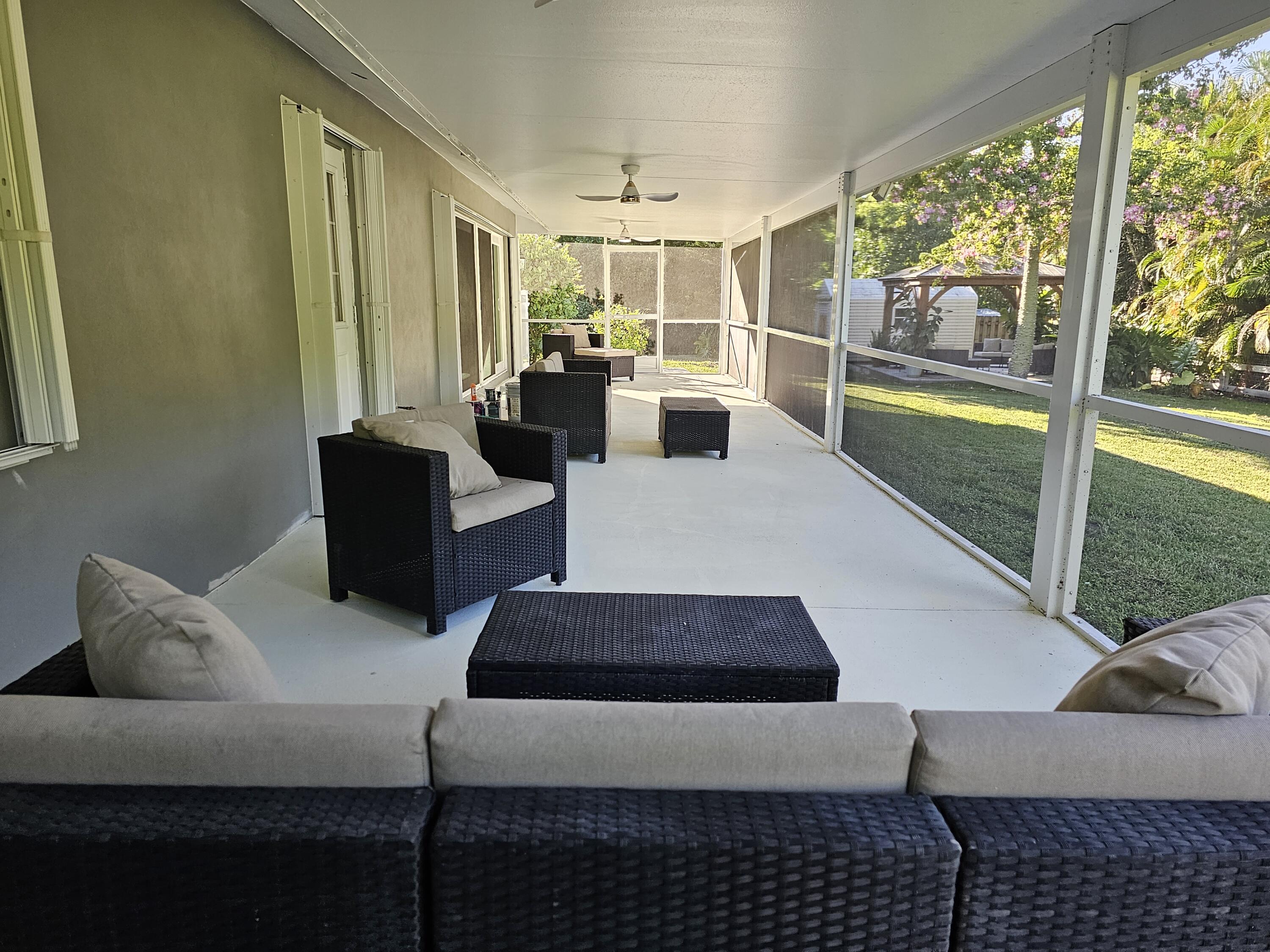 12575 52nd Road North The Acreage, FL 33411 - Photo 36 of 65 Back patio