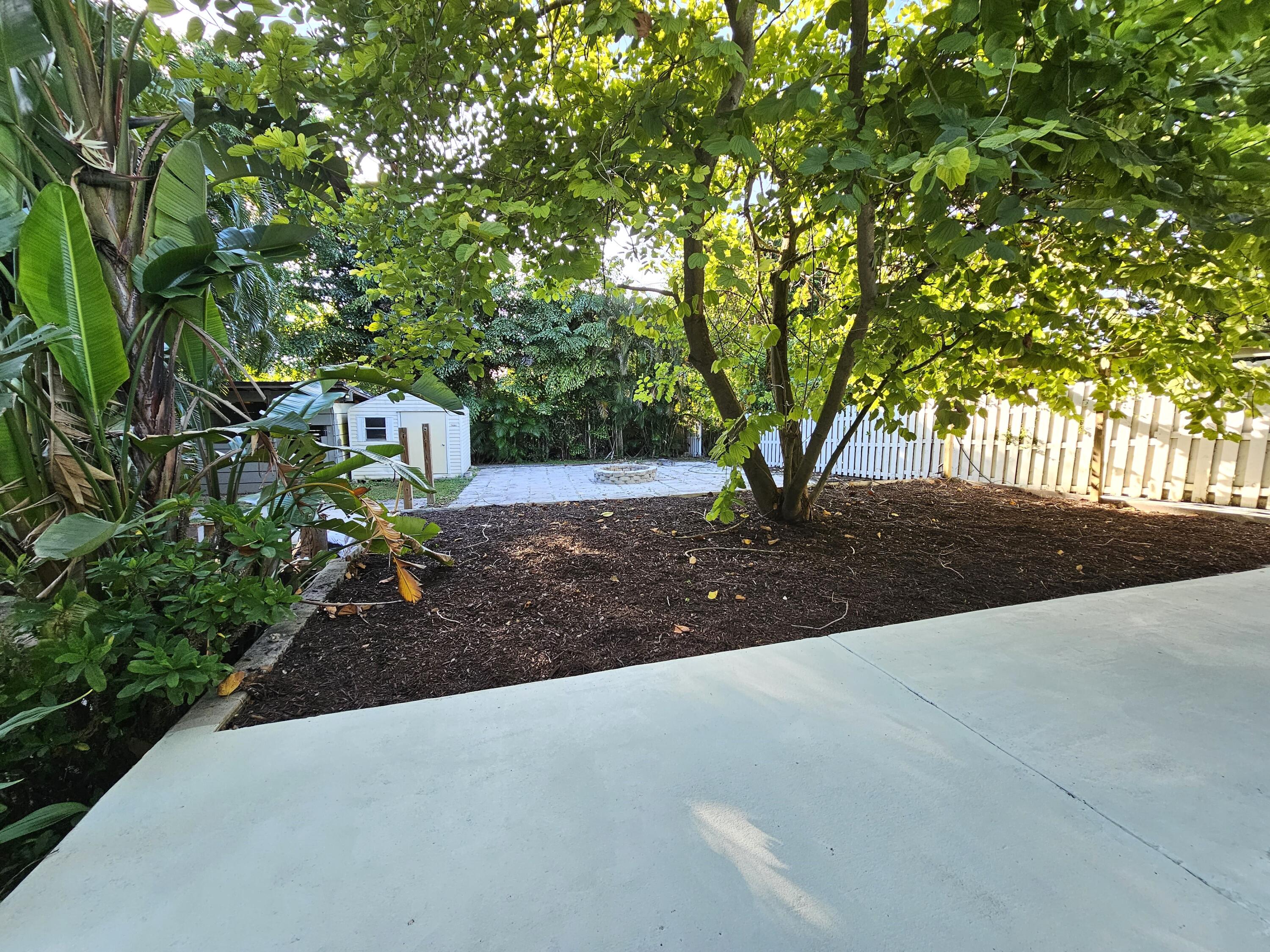 12575 52nd Road North The Acreage, FL 33411 - Photo 38 of 65 Firepit area