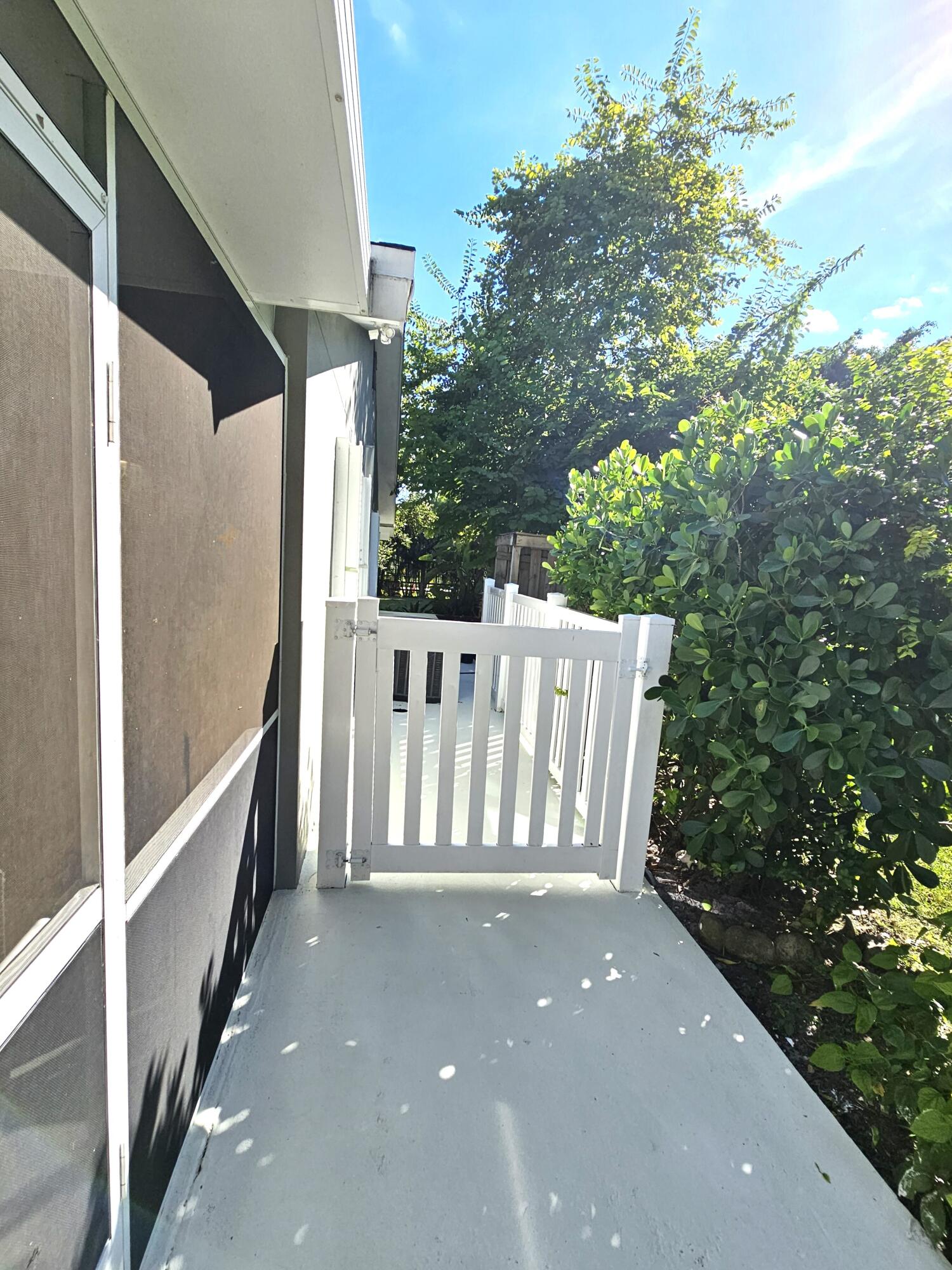 12575 52nd Road North The Acreage, FL 33411 - Photo 40 of 65 Side walkway