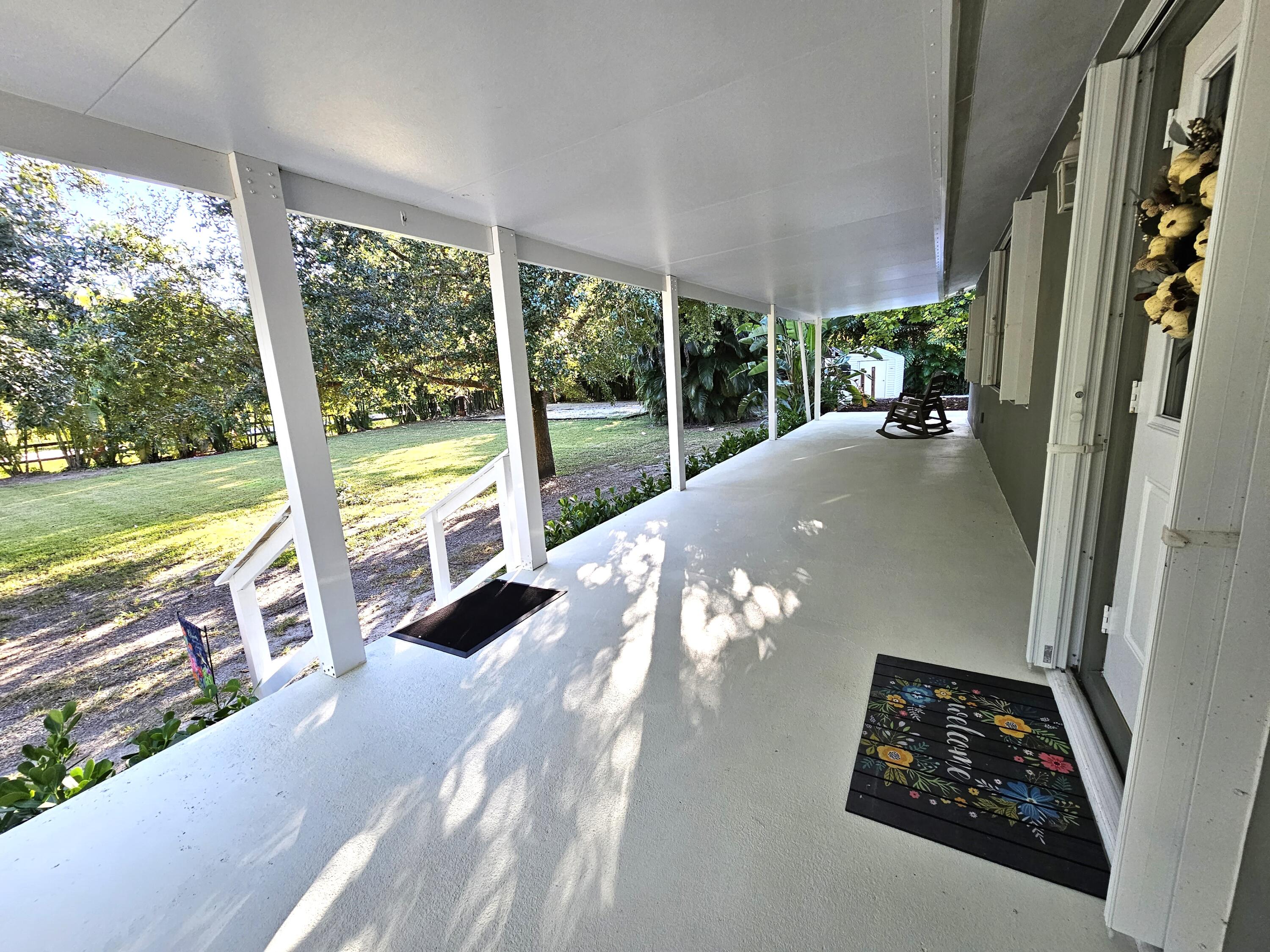 12575 52nd Road North The Acreage, FL 33411 - Photo 4 of 65 Front Patio