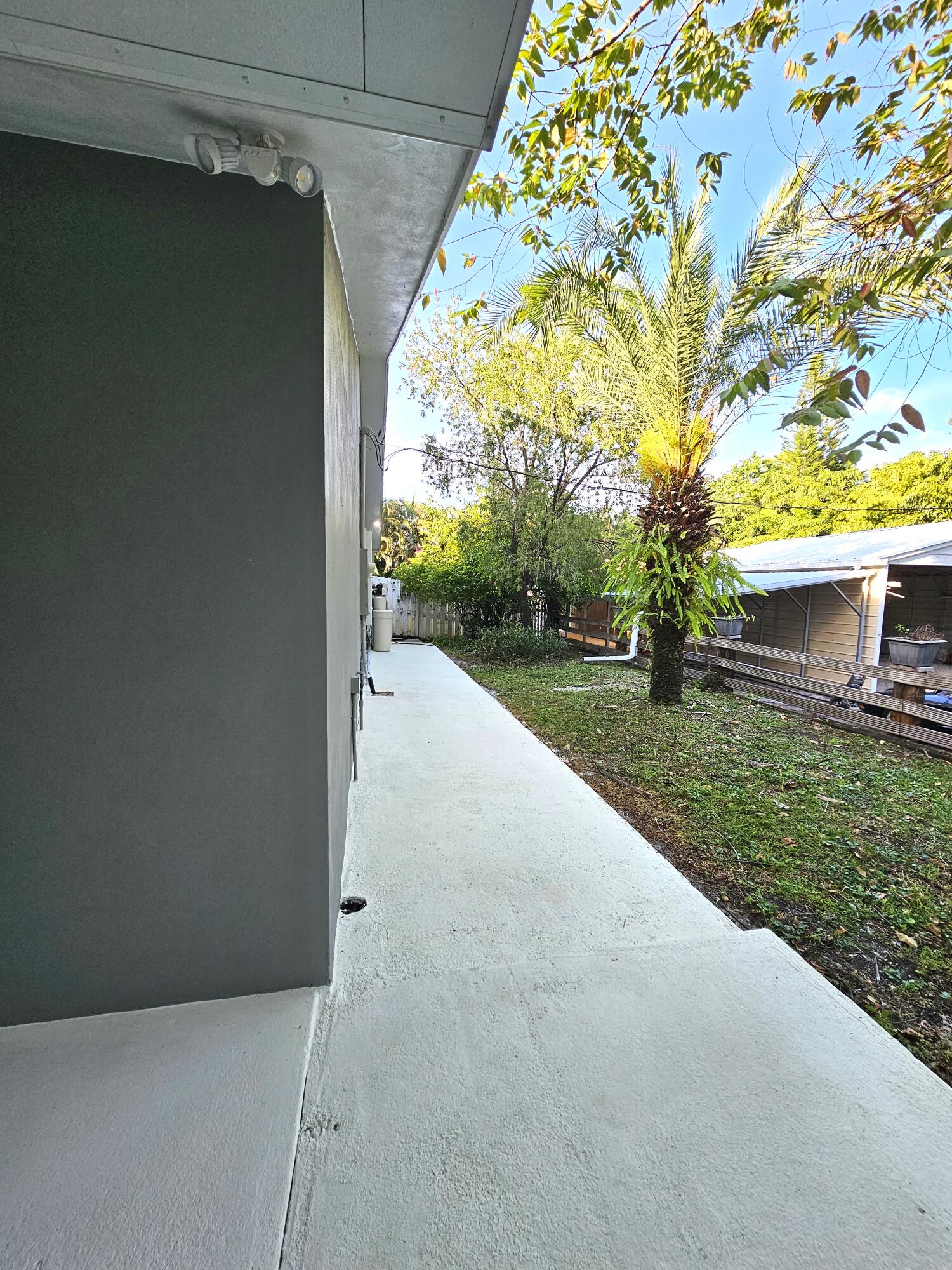 12575 52nd Road North The Acreage, FL 33411 - Photo 41 of 65 Side lawn near detached shop