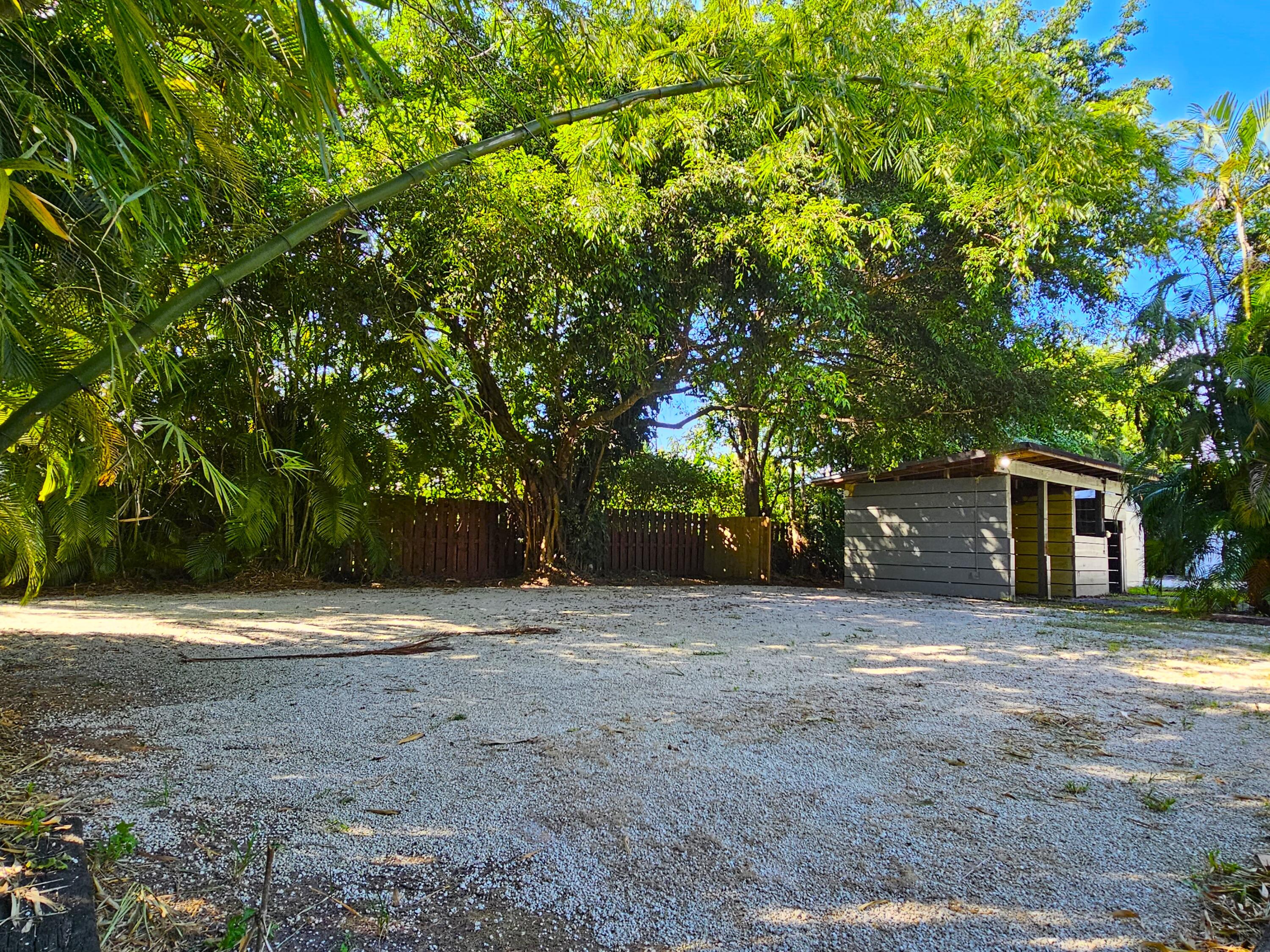 12575 52nd Road North The Acreage, FL 33411 - Photo 46 of 65 West side of property parking