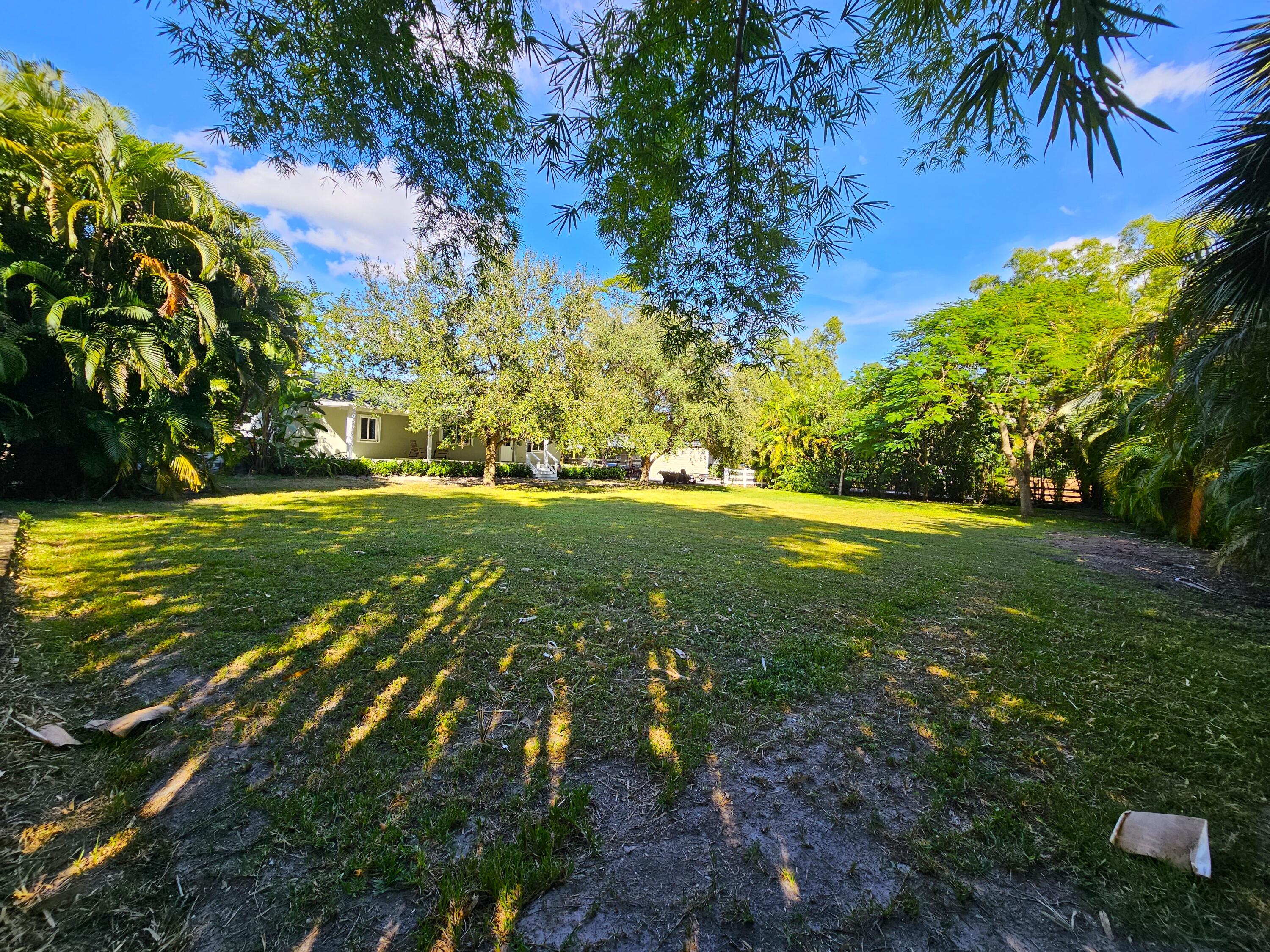 12575 52nd Road North The Acreage, FL 33411 - Photo 47 of 65 View from 2nd parking area of front lawn