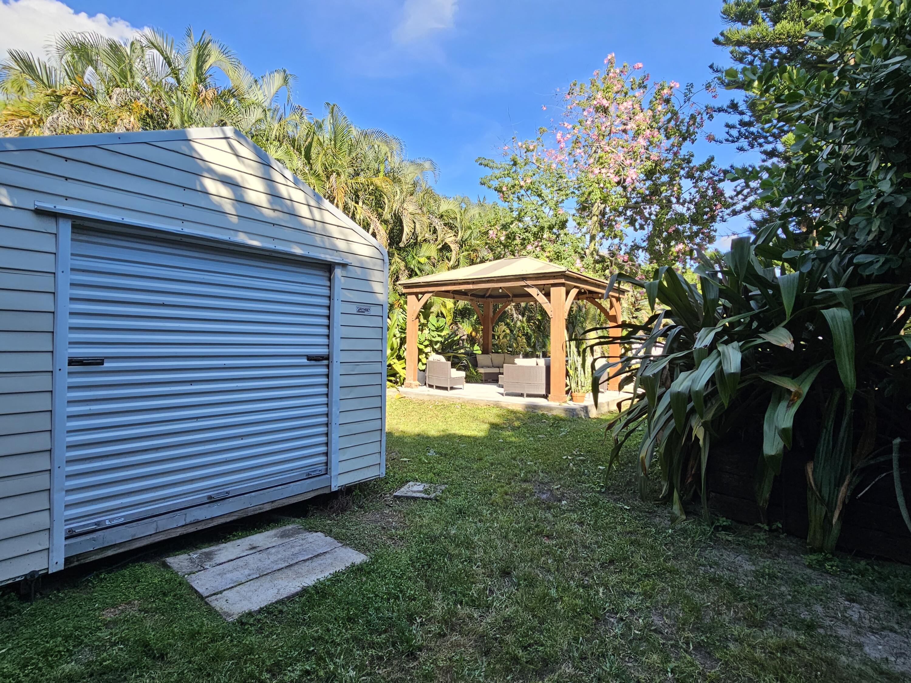 12575 52nd Road North The Acreage, FL 33411 - Photo 49 of 65 Rear shed near gazebo